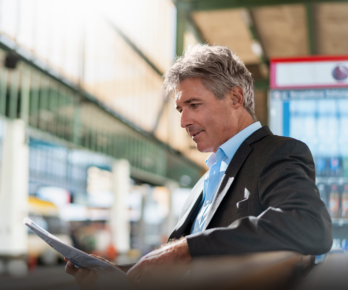  man-reading-newspaper